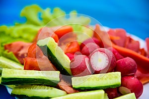 Plate with sliced vegetables