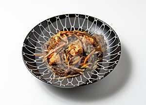 plate of soya noodles with prawns centred , isolated on white background photo