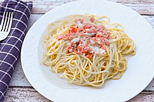 Plate of spaghetti with smoked salmon and cream