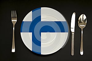 Plate with the state national flag of Finland, copy space