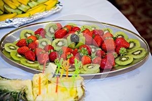 Plate of strawberries and kiwi