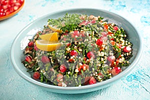 A plate of tabbouleh salad, close-up. Traditional Arabic food.