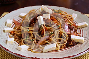 Plate of Tallarin Saltado, a Popular Peruvian Stir Fried Noodles with Beef photo