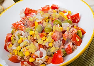 Plate of tasty salad with tuna