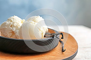 Plate with tasty vanilla ice cream