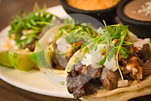 Plate of three street style tacos