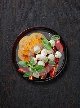 Plate of tomato and mozzarella salad