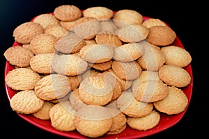 A plate of traditional Arabic cookies for celebration of Islamic holidays of El-Fitr feast, Egyptian Biscuits with shredded