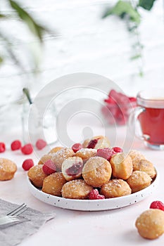 A plate with traditional berliner cakes with jelly