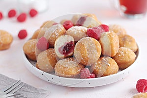 A plate with traditional berliner cakes with jelly