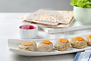 Plate of traditional Passover Pesach gefilte fish