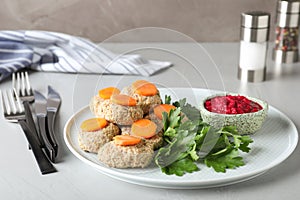 Plate of traditional Passover Pesach gefilte fish