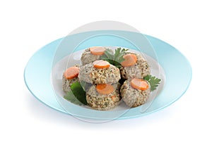 Plate of traditional Passover Pesach gefilte fish on white