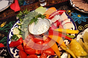 Plate with various sliced vegetables