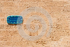 Plate on the wall of the house with street name Netiv HaMazalot