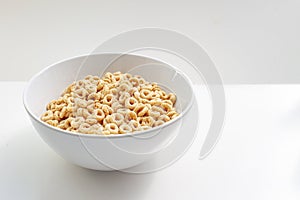 A plate of whole wheat cereal consisting of pulverized oats in the shape of a solid torus