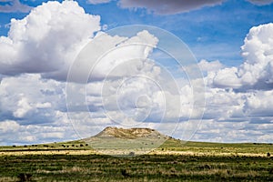 Plateau in Field with Cloudscape photo