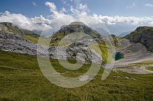 Plateau with a small mountain lake in Rofan Alps, The Brandenberg Alps, Austria, Europe photo