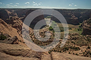 Plateaus rise up in the fertile fields of Canyon de Chelly