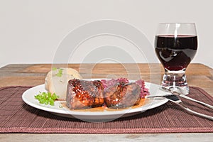 A Plated Broiled Pork Tenderloin with a Shiraz