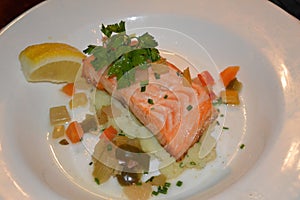 A plated salmon dinner in an Irish restaurant.