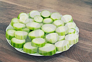 plateful of cut green zucchini