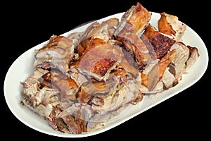 Plateful Of Gourmet Spit Roasted Tender Pork Meat Slices On Black Background