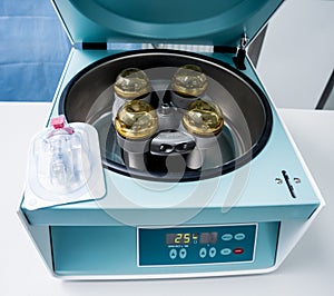 Platelet-Rich plasma preparation. Centrifuge. Modern medical background