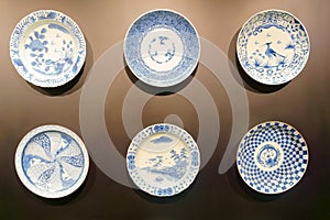 Plates on the dark wall. Japanese style