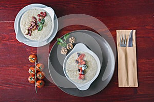 Plates with porridges with fruits, nuts, healthy Breakfast food