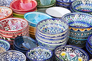 Plates and pots on a street market in the city of Bukhara, Uzbek