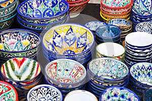 Plates and pots on a street market in the city of Bukhara, Uzbek