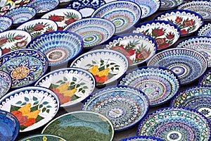 Plates and pots on a street market in the city of Bukhara, Uzbek