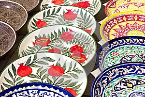 Plates and pots on a street market in the city of Bukhara, Uzbek