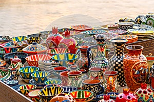 Plates and pots on a street market in the city of Bukhara, Uzbekistan