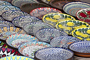Plates and pots on a street market in the city of Bukhara, Uzbekistan.Traditional souvenir