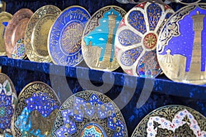 Plates and pots on a street market in the city of Bukhara, Uzbek