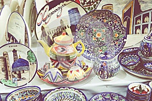 Plates and pots on a street market in the city of Khiva Uzbekistan.