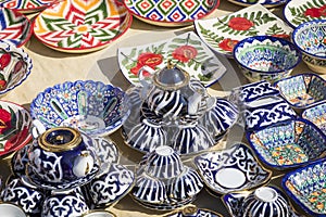 Plates and pots on a street market in the city of Khiva Uzbekistan.