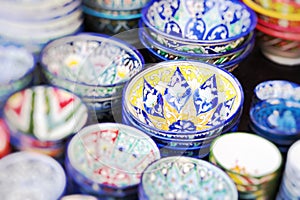 Plates and pots on a street market in the city of Khiva Uzbekistan.