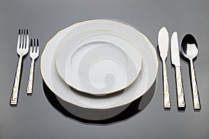 A plates and a set of silverware