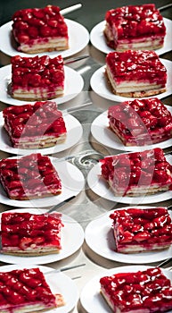 Plates with strawberry cake