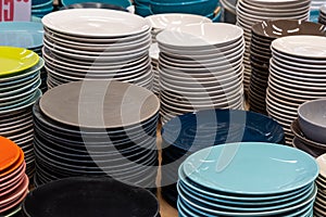 Plates and utensils in self service store. Background