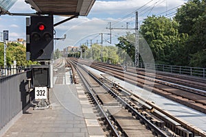 The platform and the tracks of Bellevue S-Bahn Railway Station S-Bahnhof Bellevue in Berlin, Germany.