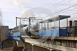 Platforms and railroad tracks at train station Nieuwerkerk aan den IJssel