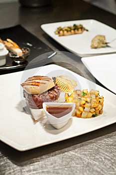 Plating a foie gras dish