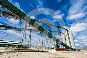 Platinum Mining and Processing of ore, Conveyor belt transporting ore rich tock to storage silos photo