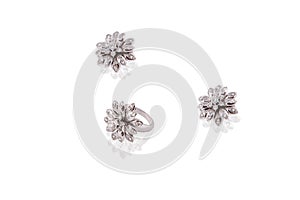 Platinum precious earrings ring flower female with diamonds on white isolated background.