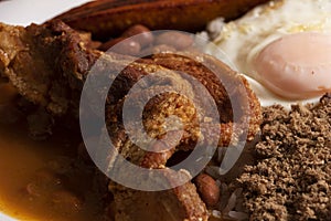 Plato de comida popular de Antioquia Colombia con frijoles huevo, cero carne y plÃÂ¡tano photo