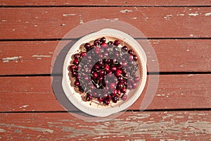 A Platter of Cherries on a Rustic Picnic Table